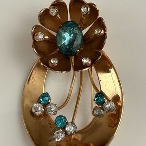 Vintage Coro blue & white rhinestone gold plated flower brooch. Signed pin.